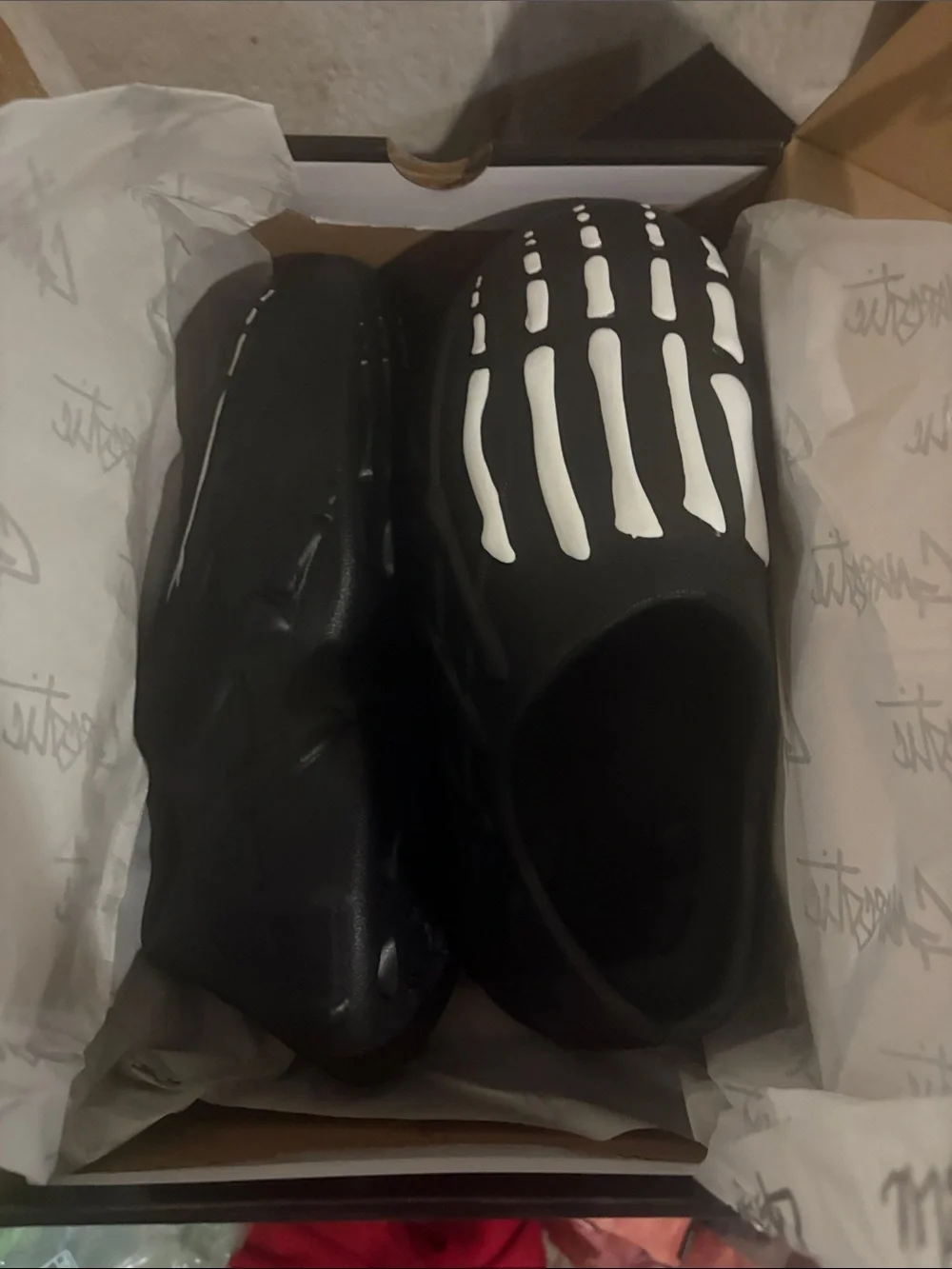 Black Slip-On Clog with White Skeleton Footprint